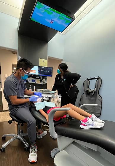 dr. rich with pediatric dental patient | childrens dentist belton tx